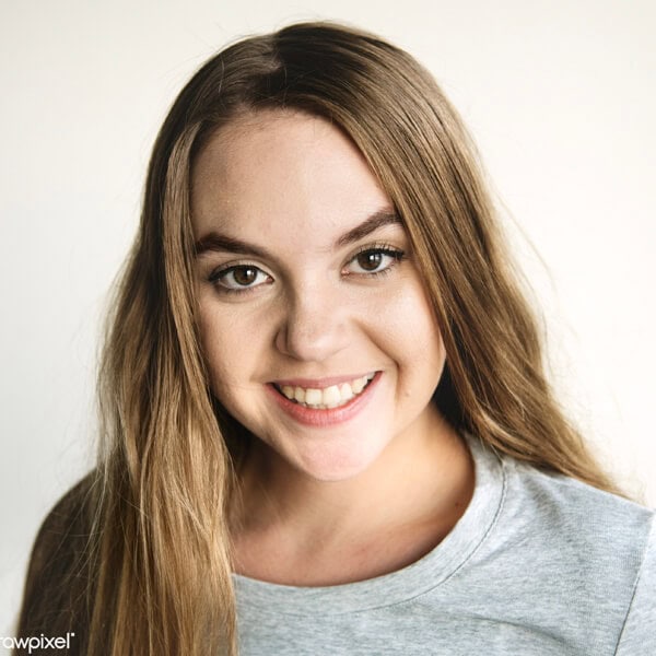Professional woman smiling, representing ENIXEN Group's corporate excellence.