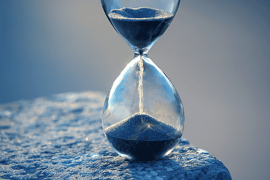 Hourglass symbolizing time management and efficiency.