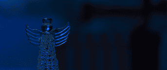 Close-up of the ENIXEN Group logo with blue lighting effects.